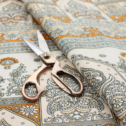 An intricate, traditional Indian-inspired print featuring rows of archways filled with ornate paisleys and floral motifs, separated by decorative borders.