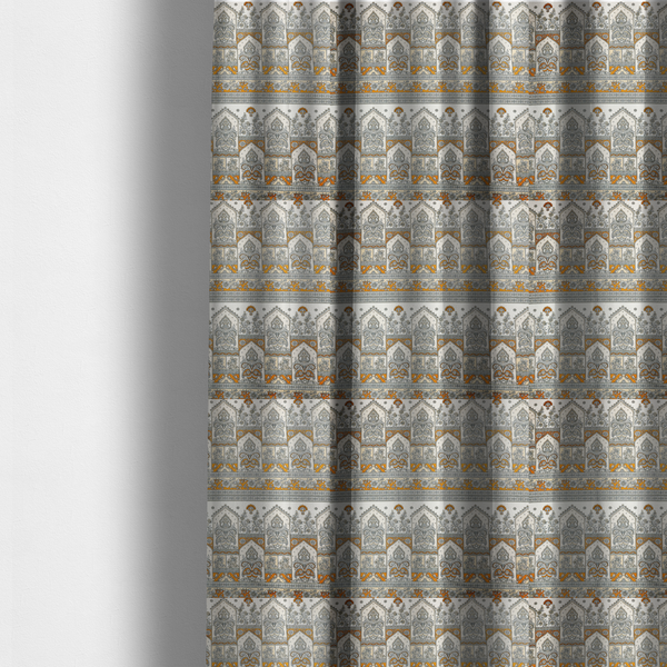 The fabric used to create these made-to-measure curtains is a intricate, traditional Indian-inspired print featuring rows of archways filled with ornate paisleys and floral motifs, separated by decorative borders.