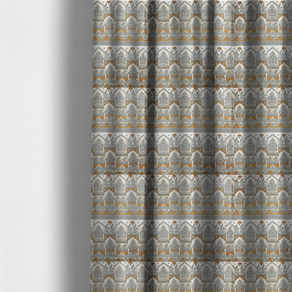 The fabric used to create these made-to-measure curtains is a intricate, traditional Indian-inspired print featuring rows of archways filled with ornate paisleys and floral motifs, separated by decorative borders.
