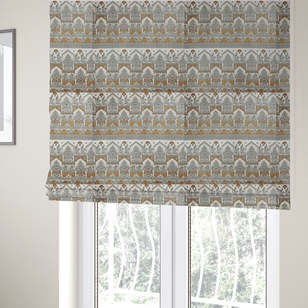 The fabric used to create these Roman blinds is a intricate, traditional Indian-inspired print featuring rows of archways filled with ornate paisleys and floral motifs, separated by decorative borders.