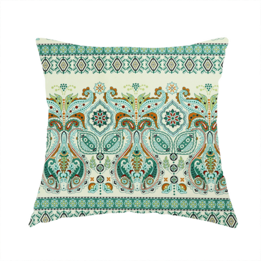 The fabric used to create this handmade cushion is a horizontal bands of intricate, traditional-inspired paisley motifs and geometric diamond patterns separated by decorative borders.