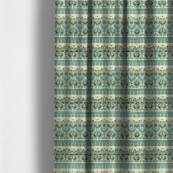 The fabric used to create these made-to-measure curtains is a horizontal bands of intricate, traditional-inspired paisley motifs and geometric diamond patterns separated by decorative borders.
