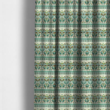 The fabric used to create these made-to-measure curtains is a horizontal bands of intricate, traditional-inspired paisley motifs and geometric diamond patterns separated by decorative borders.