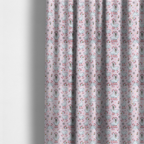The fabric used to create these made-to-measure curtains is a cute, whimsical cartoon print featuring white geese wearing pink rain boots and matching pink hats or bows, interspersed with small flowers, hearts, and sparkles.