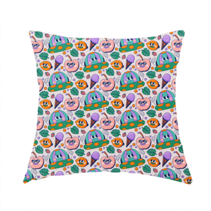 The fabric used to create this handmade cushion is a whimsical, retro-cartoon repeat pattern featuring cute anthropomorphic characters and treats.