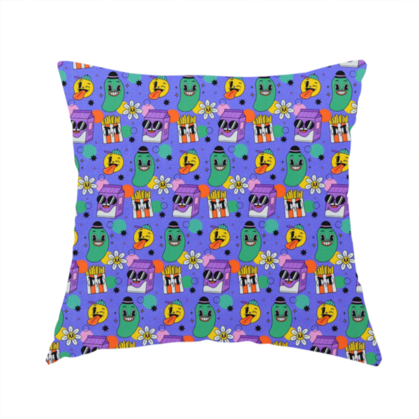 The fabric used to create this handmade cushion is a vibrant, retro-cartoon all-over print featuring quirky, smiling food and character motifs against a blue-purple background.