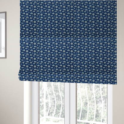 The fabric used to create these Roman blinds is a nautical-themed fabric pattern featuring alternating rows of light blue and gold sailing ships, compass roses, anchors, and fish against a dark blue background.