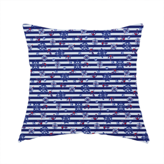 The fabric used to create this handmade cushion is a nautical-themed fabric pattern featuring alternating horizontal stripes of navy blue and light blue, scattered with small dark blue ship's wheels, red anchors, and compass roses.