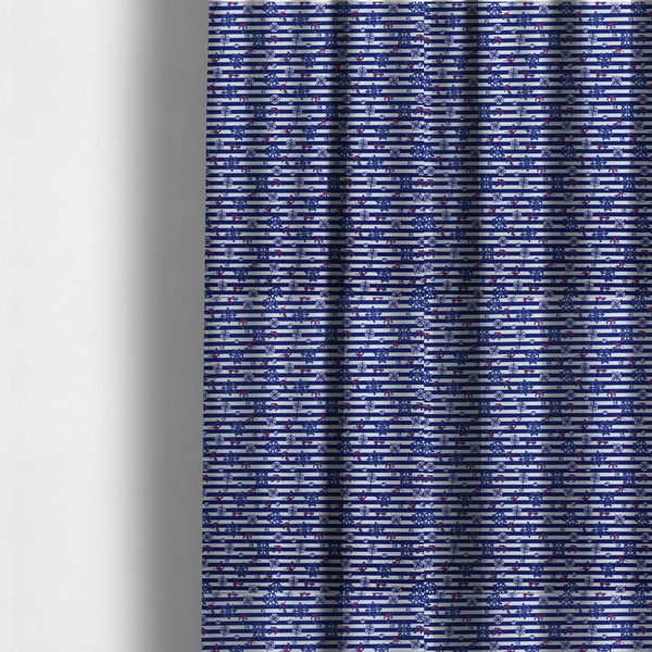 The fabric used to create these made-to-measure curtains is a nautical-themed fabric pattern featuring alternating horizontal stripes of navy blue and light blue, scattered with small dark blue ship's wheels, red anchors, and compass roses.