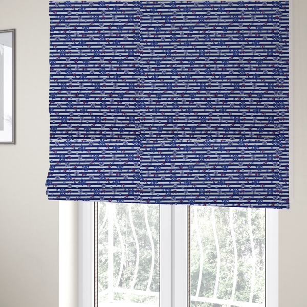 The fabric used to create these Roman blinds is a nautical-themed fabric pattern featuring alternating horizontal stripes of navy blue and light blue, scattered with small dark blue ship's wheels, red anchors, and compass roses.