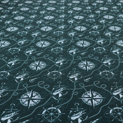 A nautical-themed fabric pattern featuring light blue compass roses, ships, anchors, and intertwined ropes against a dark teal or green background.