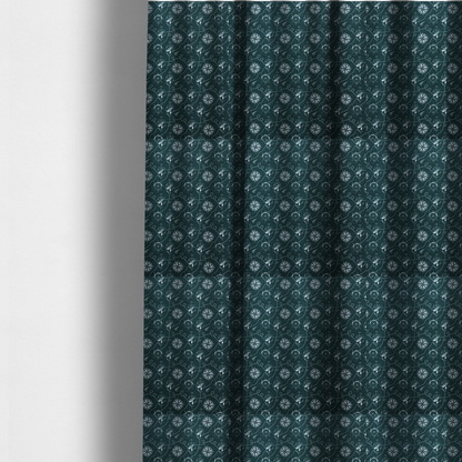 The fabric used to create these made-to-measure curtains is a nautical-themed fabric pattern featuring light blue compass roses, ships, anchors, and intertwined ropes against a dark teal or green background.