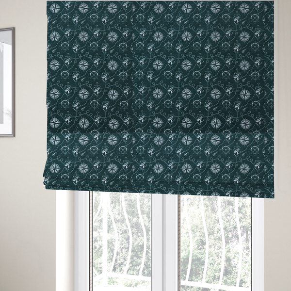 The fabric used to create these Roman blinds is a nautical-themed fabric pattern featuring light blue compass roses, ships, anchors, and intertwined ropes against a dark teal or green background.
