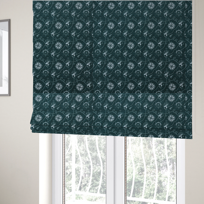 The fabric used to create these Roman blinds is a nautical-themed fabric pattern featuring light blue compass roses, ships, anchors, and intertwined ropes against a dark teal or green background.
