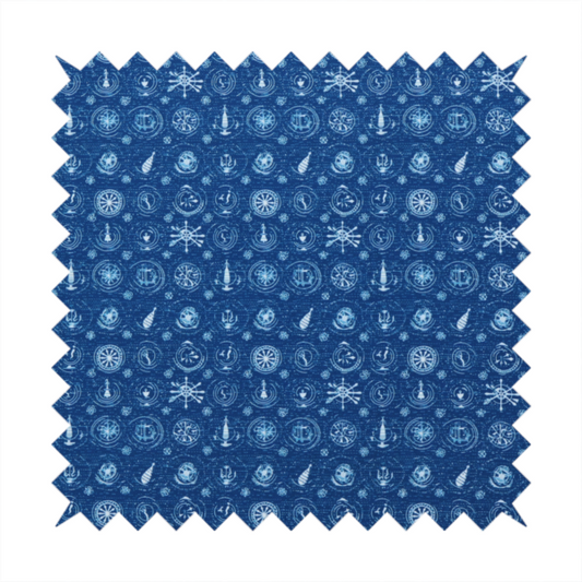 A nautical-themed fabric pattern featuring an all-over small-scale print of white ship's wheels, anchors, compass roses, and nautical motifs against a textured dark blue background.