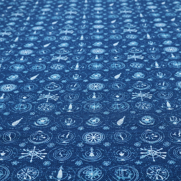 A nautical-themed fabric pattern featuring an all-over small-scale print of white ship's wheels, anchors, compass roses, and nautical motifs against a textured dark blue background.