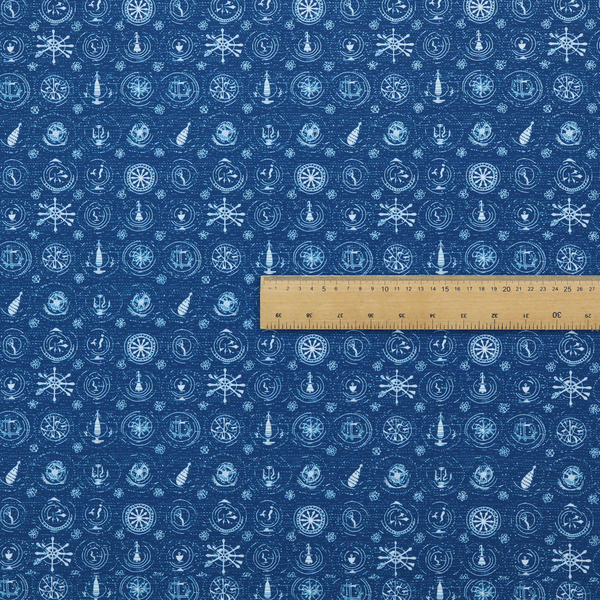 A nautical-themed fabric pattern featuring an all-over small-scale print of white ship's wheels, anchors, compass roses, and nautical motifs against a textured dark blue background.