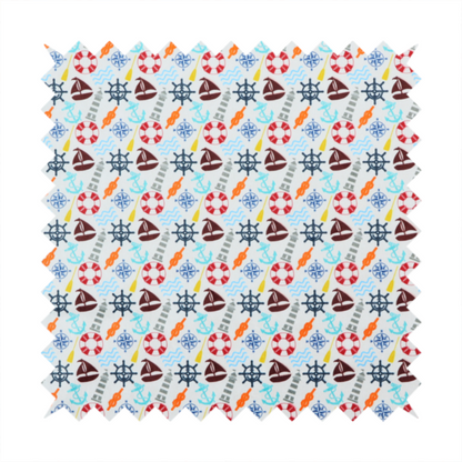 A colourful nautical-themed fabric pattern featuring a repeating mix of lighthouses, sailboats, life rings, ship's wheels, anchors, and waves against a white background.