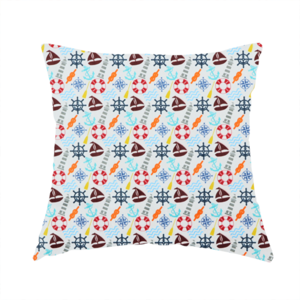 The fabric used to create this handmade cushion is a colourful nautical-themed fabric pattern featuring a repeating mix of lighthouses, sailboats, life rings, ship's wheels, anchors, and waves against a white background.