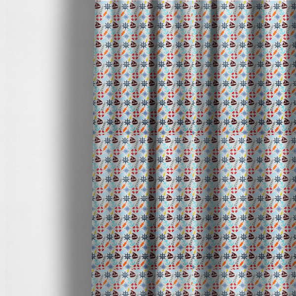 The fabric used to create these made-to-measure curtains is a colourful nautical-themed fabric pattern featuring a repeating mix of lighthouses, sailboats, life rings, ship's wheels, anchors, and waves against a white background.