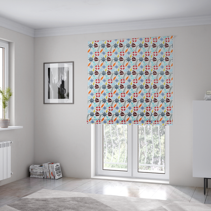 The fabric used to create these Roman blinds is a colourful nautical-themed fabric pattern featuring a repeating mix of lighthouses, sailboats, life rings, ship's wheels, anchors, and waves against a white background.