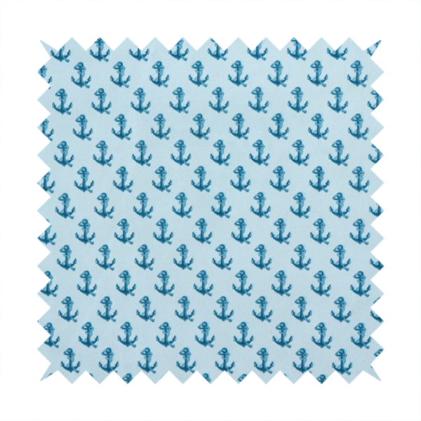 A nautical-themed fabric pattern featuring a repeating print of dark blue anchors against a light blue background.