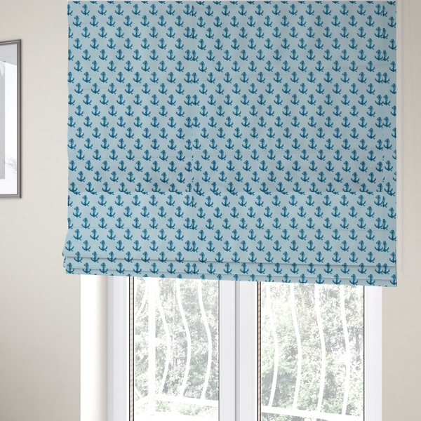 The fabric used to create these Roman blinds is a nautical-themed fabric pattern featuring a repeating print of dark blue anchors against a light blue background.