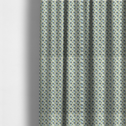 the fabric used to create these made-to-measure curtains is a pattern features a nautical theme consisting of ships' steering wheels, anchors, and vertical chains.