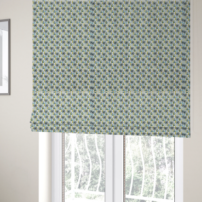 The fabric used to create these Roman blinds is a pattern features a nautical theme consisting of ships' steering wheels, anchors, and vertical chains.