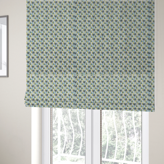 The fabric used to create these Roman blinds is a pattern features a nautical theme consisting of ships' steering wheels, anchors, and vertical chains.