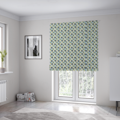 The fabric used to create these Roman blinds is a pattern features a nautical theme consisting of ships' steering wheels, anchors, and vertical chains.