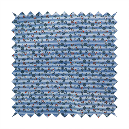 The pattern features a nautical theme filled with tiny ships' steering wheels, anchors, and lifebuoys scattered across the fabric.