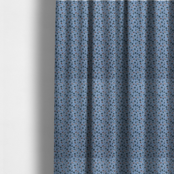 The fabric used to create these made-to-measure curtains is a pattern features a nautical theme filled with tiny ships' steering wheels, anchors, and lifebuoys scattered across the fabric.