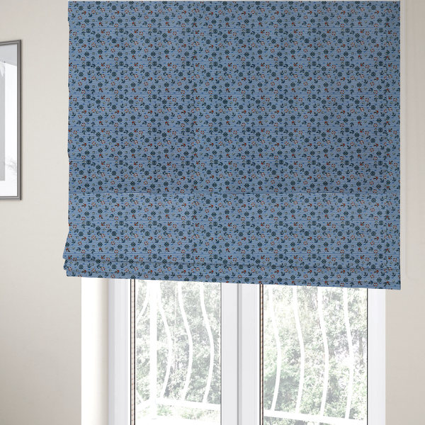 The fabric used to create these Roman blinds is a pattern features a nautical theme filled with tiny ships' steering wheels, anchors, and lifebuoys scattered across the fabric.