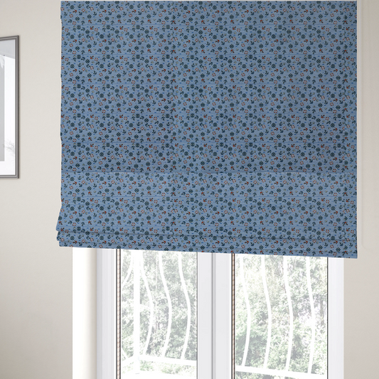 The fabric used to create these Roman blinds is a pattern features a nautical theme filled with tiny ships' steering wheels, anchors, and lifebuoys scattered across the fabric.
