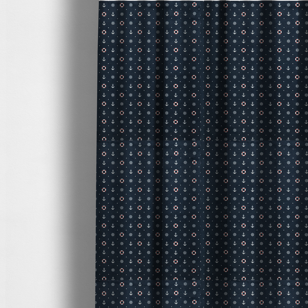 The fabric used to create these made-to-measure curtains is a pattern features a nautical-themed design consisting of alternating rows and grids of white anchors, ship's steering wheels, and red-and-white lifebuoys, accented by small white polka dots.