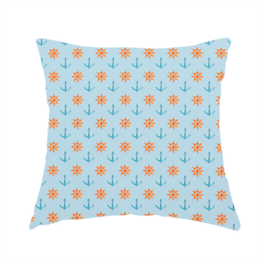 The fabric used to create this handmade cushion is a pattern features a nautical-themed design consisting of alternating rows of ship's steering wheels and small anchors.