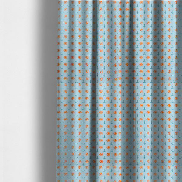 The fabric used to create these made-to-measure curtains is a  pattern features a nautical-themed design consisting of alternating rows of ship's steering wheels and small anchors.