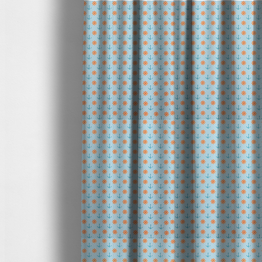 The fabric used to create these made-to-measure curtains is a  pattern features a nautical-themed design consisting of alternating rows of ship's steering wheels and small anchors.