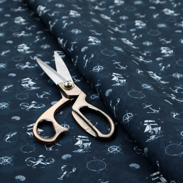 The pattern features a detailed nautical theme including sailing ships, octopuses, anchors, compasses, seashells, and lobsters.