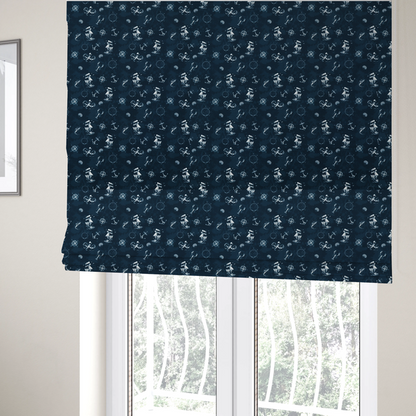 The fabric used to create these Roman blinds is a pattern features a detailed nautical theme including sailing ships, octopuses, anchors, compasses, seashells, and lobsters.