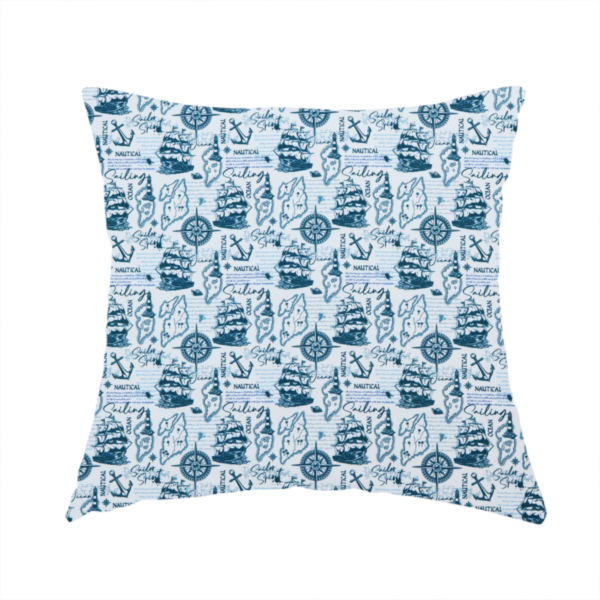 The fabric used to create this handmade cushion is a pattern features a dense nautical collage consisting of sailing ships, maps or landmasses, compass roses, anchors, lighthouses, and cursive typography with words like "Sailing," "Ocean," "Nautical," and "Sailor Spirit."