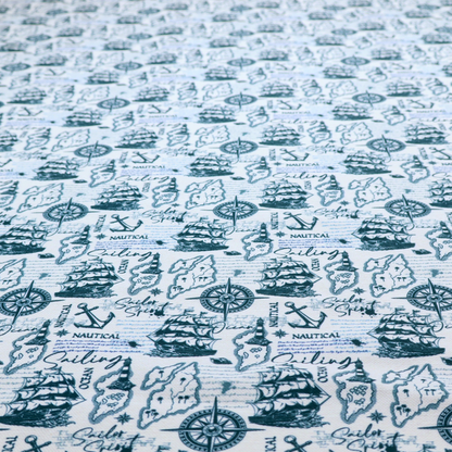 The pattern features a dense nautical collage consisting of sailing ships, maps or landmasses, compass roses, anchors, lighthouses, and cursive typography with words like "Sailing," "Ocean," "Nautical," and "Sailor Spirit."