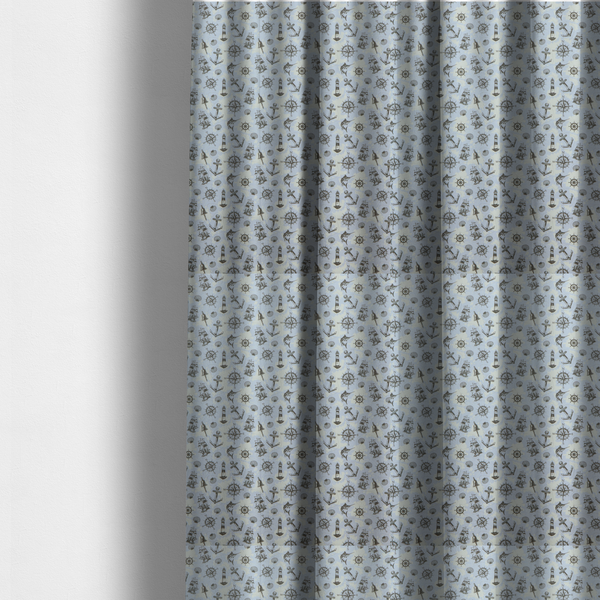 The fabric used to create these made-to-measure curtains is a pattern features a nautical-themed collage consisting of lighthouses, sailing ships, anchors, compasses, compass roses, seashells, ship bells, and marlin fish.
