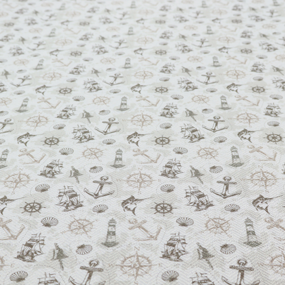 The pattern features a nautical-themed collage containing lighthouses, sailing ships, anchors, compass roses, seashells, steering wheels, ship bells, and marlin fish.