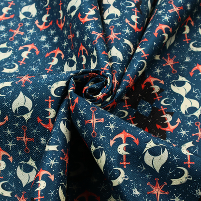 The pattern features an intricate, symmetrical nautical motif including anchors, stars, crescent shapes, and ornamental crests or panels.