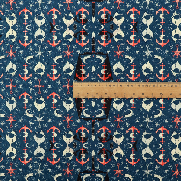 The pattern features an intricate, symmetrical nautical motif including anchors, stars, crescent shapes, and ornamental crests or panels.