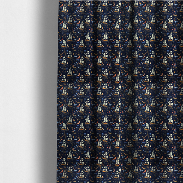 The fabric used to create these made-to-measure curtains is a dark navy blue fabric patterned with a repeating pirate-themed design featuring multi-sailed galleon ships with skull-and-crossbones flags sailing on stylized waves, accompanied by smaller elements including blue whales, crescent moons, skulls, tropical palm trees, and anchors.