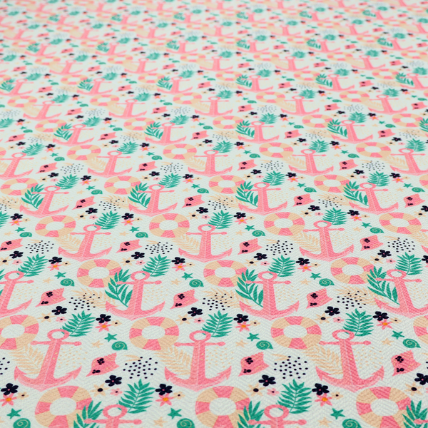 A light mint green fabric with a repeating nautical pattern featuring pink anchors framed by teal palm fronds, interspersed with pink and white striped life rings, tiny dark blue flowers, and small coral shells.