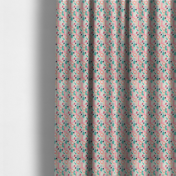 The fabric used to create these made-to-measure curtains is a light mint green fabric with a repeating nautical pattern featuring pink anchors framed by teal palm fronds, interspersed with pink and white striped life rings, tiny dark blue flowers, and small coral shells.